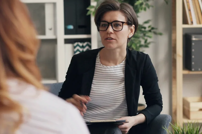 Psychologist reviewing a professional referral